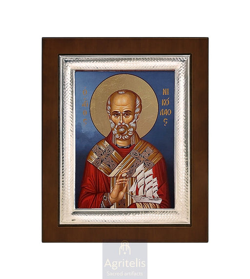 Сребрна икона, Αγριτέλης црквени предмети, ieraskevi.com, Свети Никола са бродом плава позадина 26,5 x 21,5 cm